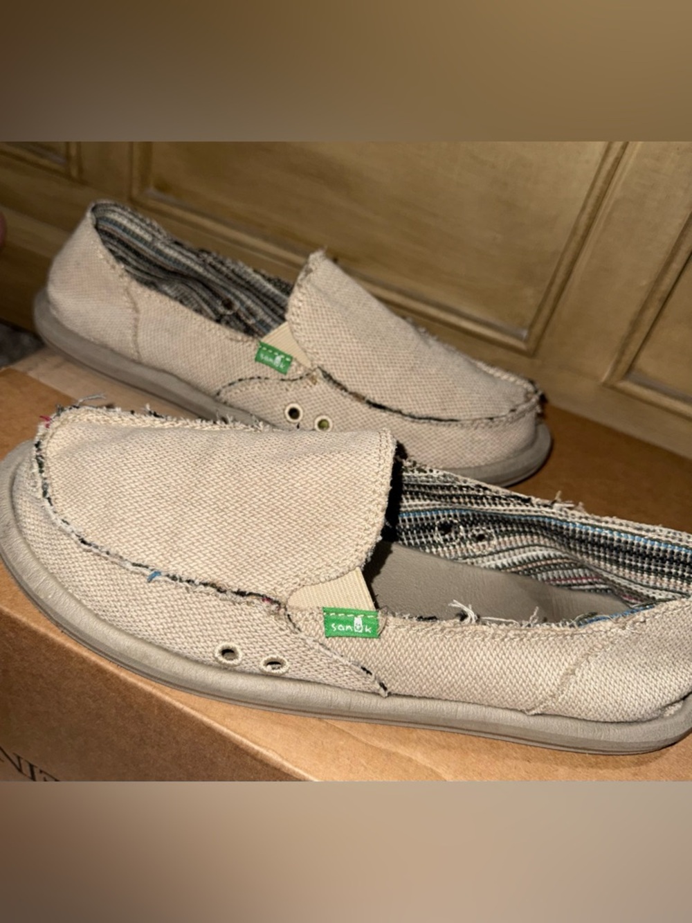 Sanuk Women’s size 10, Men’s size 8.5. Canvas Slip-On with Striped Lining